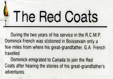 sign about The Red Coats  mural in Boissevain
